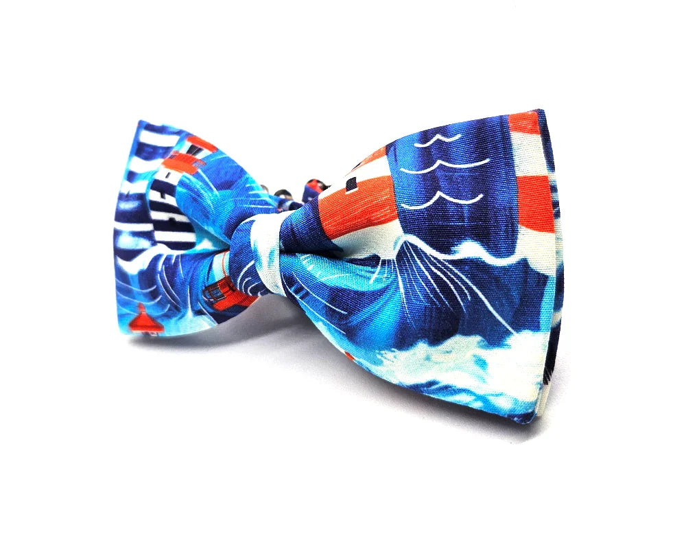 Pajarita de fondo azul, con faros y olas tamaño adulto